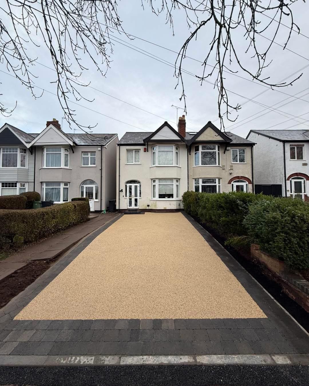 Resin-bound driveway installation with block paving edging in Glasgow