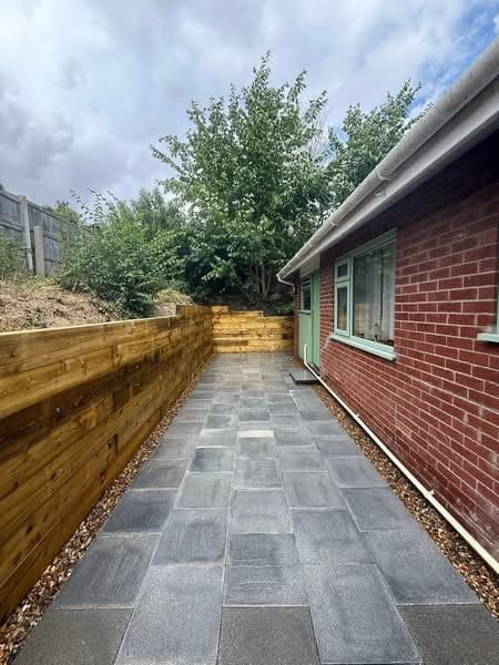 Retaining wall alongside garden pathway