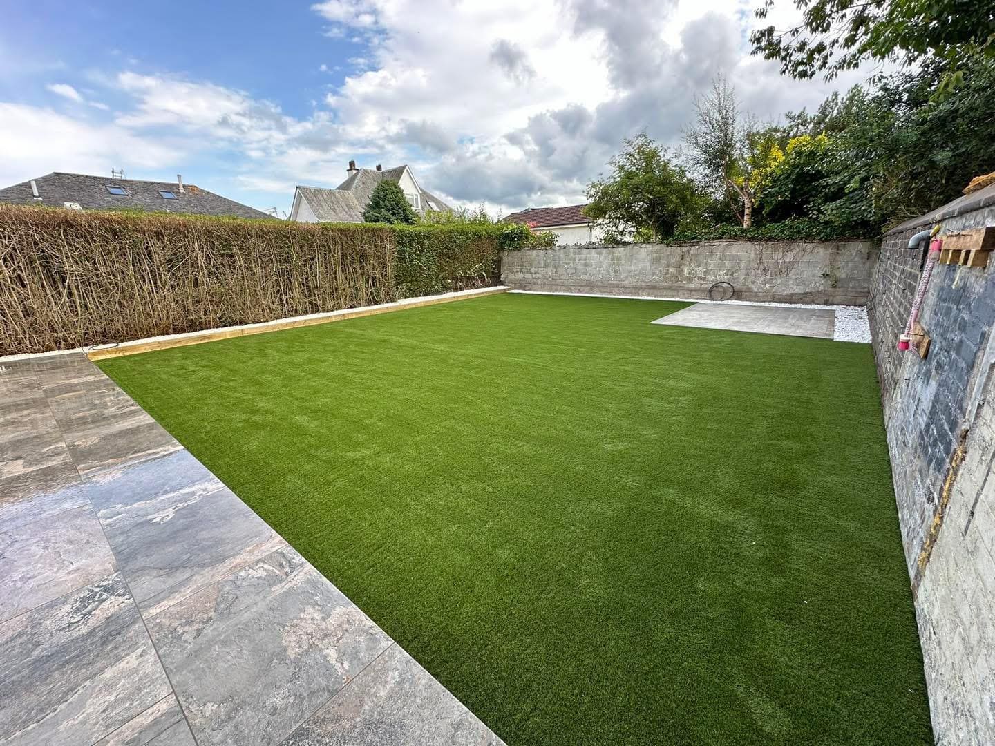 New turf lawn installation in residential garden