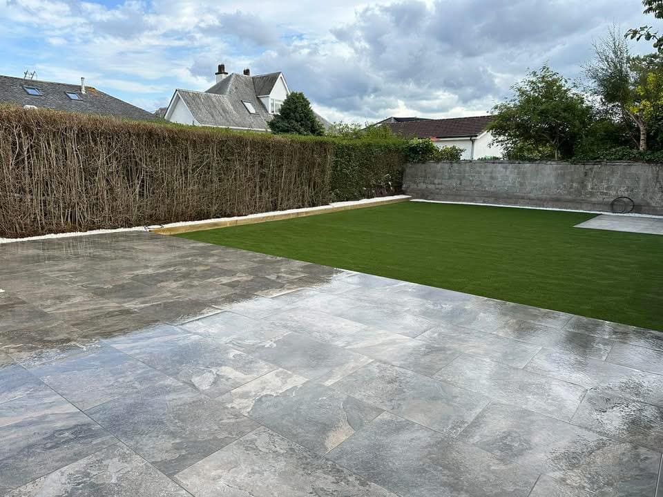 Fresh turf laid alongside new patio area in Glasgow garden